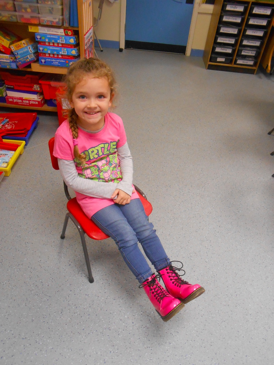 Maya shows off her cool pink books