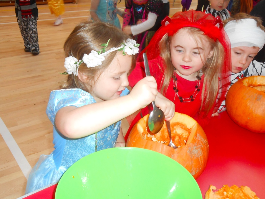 Sienna in P.1 scoops out some pumpkin!