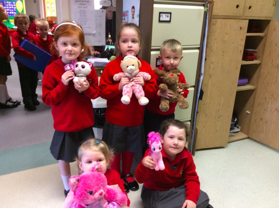 Comparing the sizes of our teddies