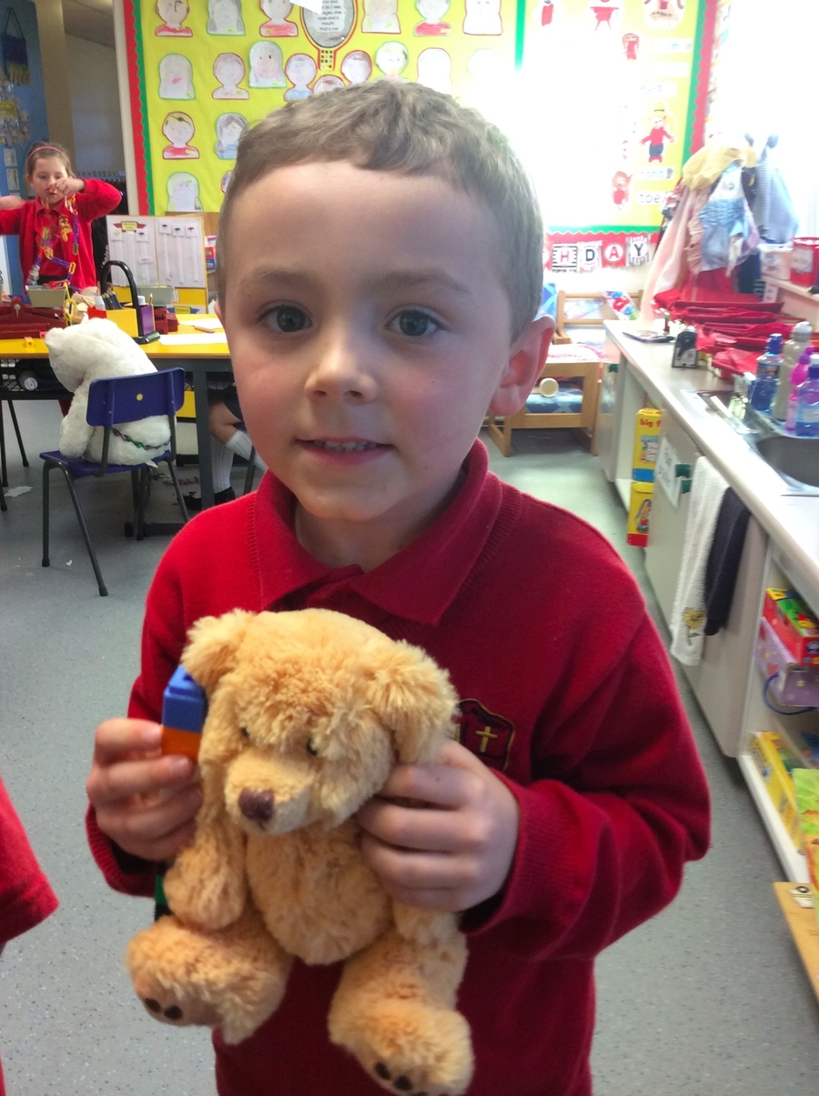 Jay P.2D measures the height of his bear
