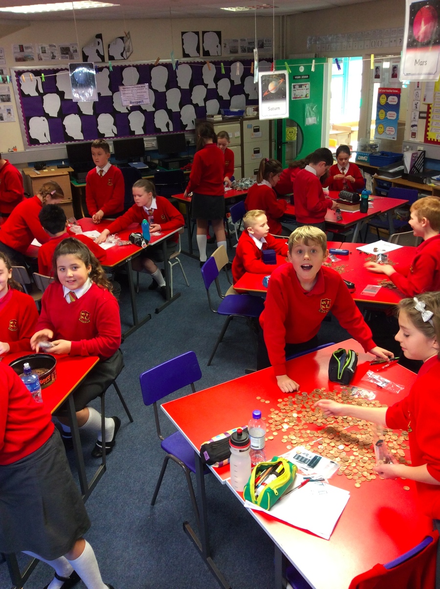 P.7R enjoy counting all the money for Children in Need