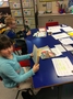 Clanagh and Kaden displaying their Book Week photos and activities.JPG