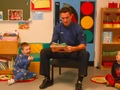 P1 welcolmed Johnny Tuffey to read a story..JPG