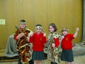 Oliver, Mollie, Niamh and Holly dressing up as Stone Age people..JPG