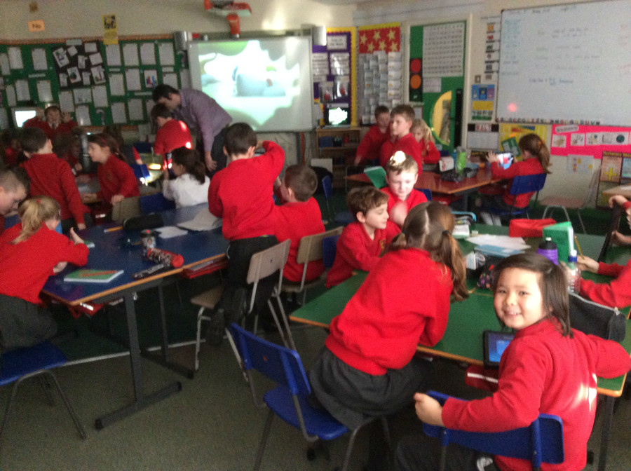 Graeme from AMMA providing the children with information on types of photographs.