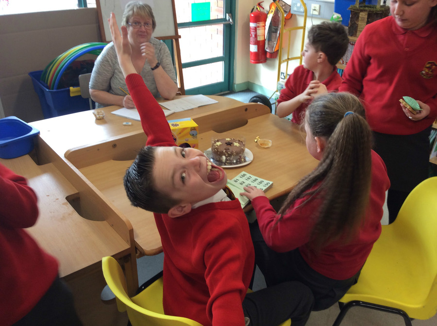 Adam and Dearbhla sell raffle tickets, whilst Mrs Hamilton keeps a watchful ey!