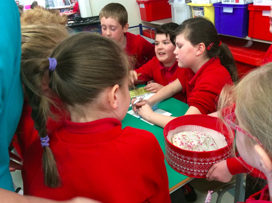 Conor Leo and Jade sell raffle tickets to P.3/4.