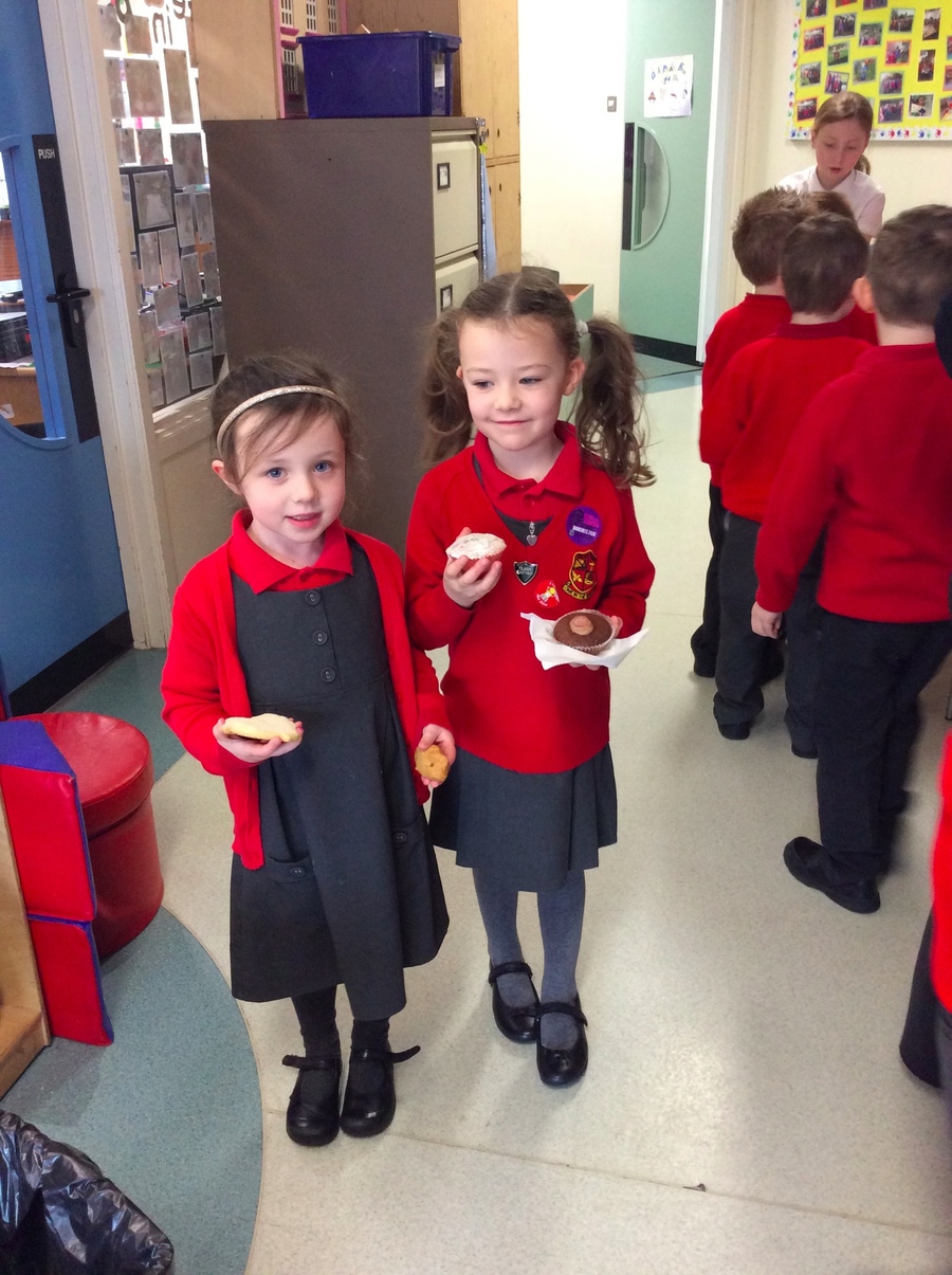Rachel and Rose can't wait to taste their buns!