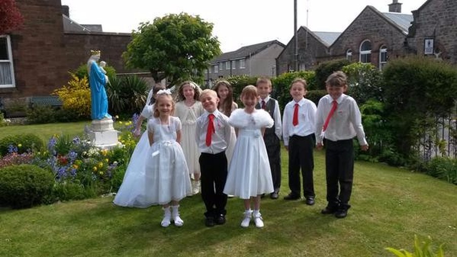 Nine children from Class Three celebrated receiving the sacrament of the Eucharist for the first time on Sunday 14th May.  It was a beautiful day celebrated by the whole parish community.