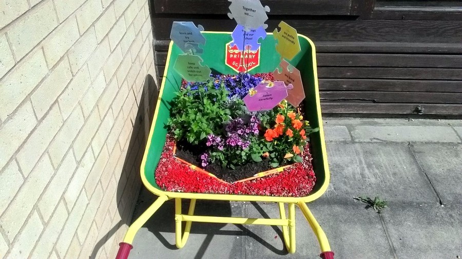 This floral jigsaw art was created by the children and on display in Frost's Garden Centre