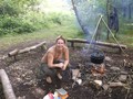 Keri next to fire.JPG