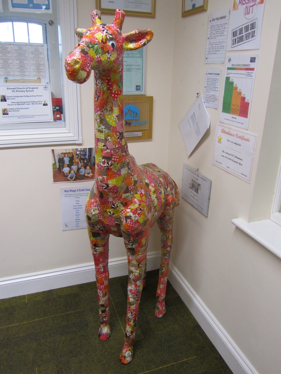 A collective craft club creation! He has pride of place in our office entrance to welcome visitors to the school!