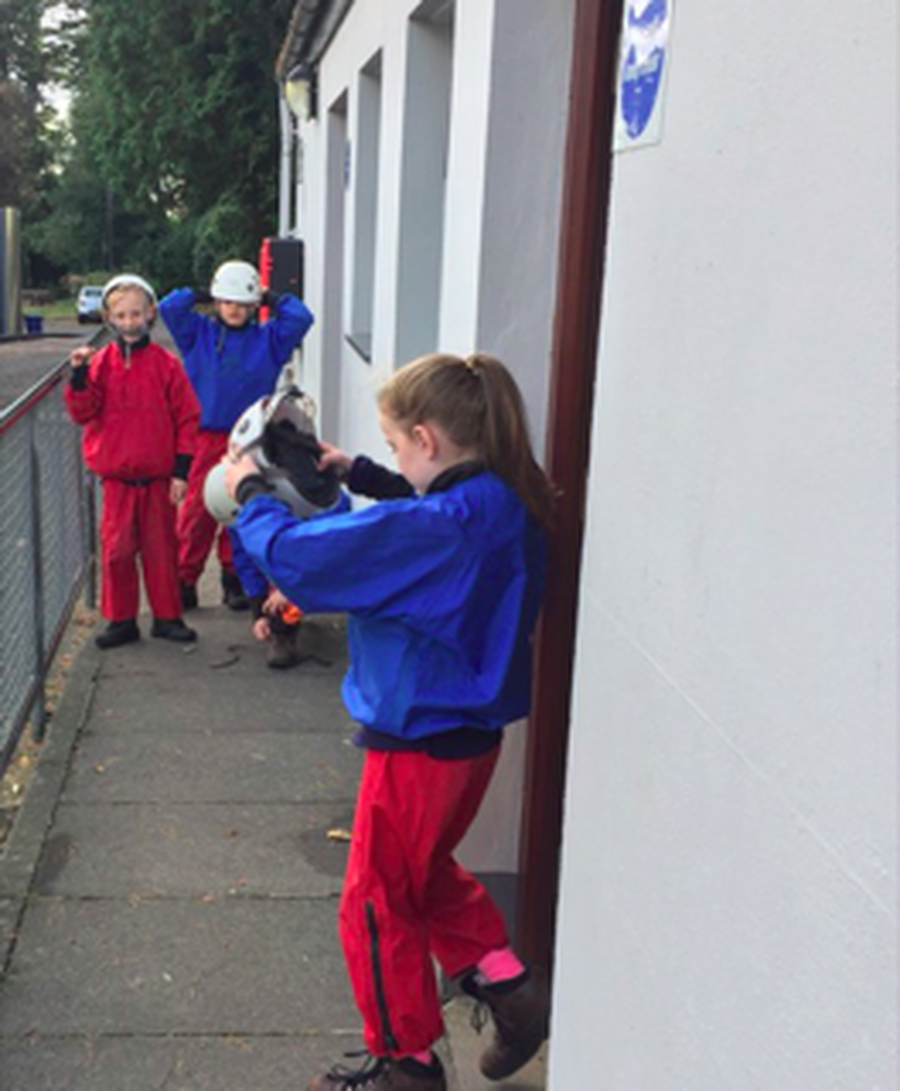 Getting all our outdoor gear on before we head out on our first activity