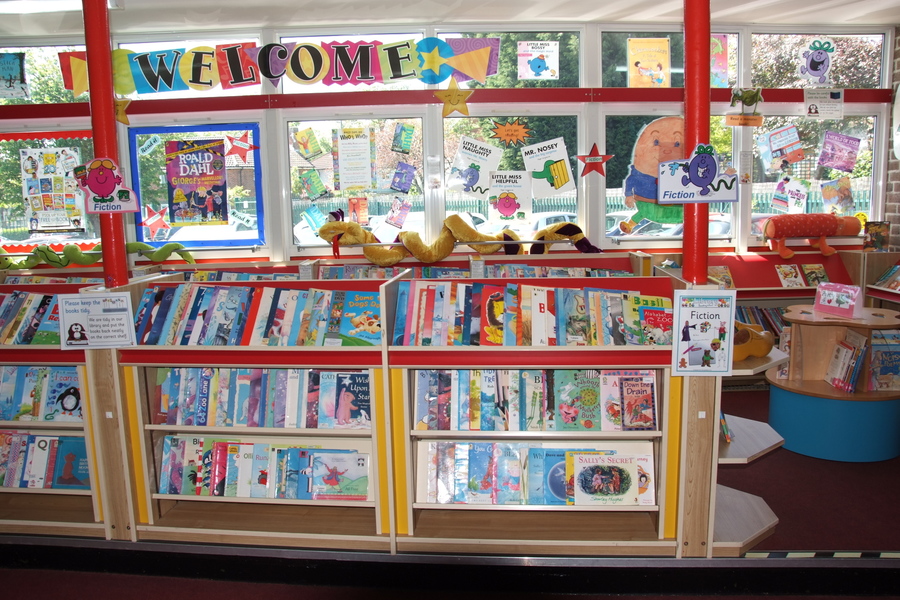 Lynpac Library. Children borrow books to take home to read. We have parents come into school to help run the Library.